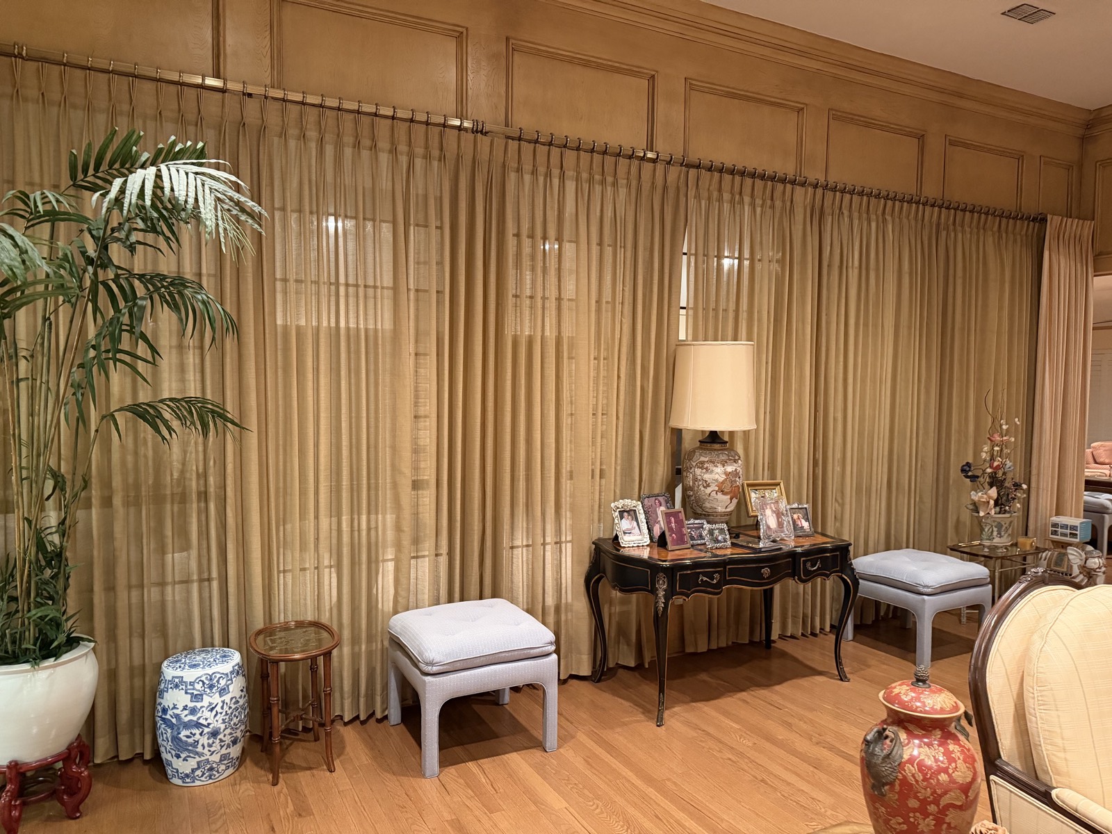 Sitting nook with silk drapery and writing desk